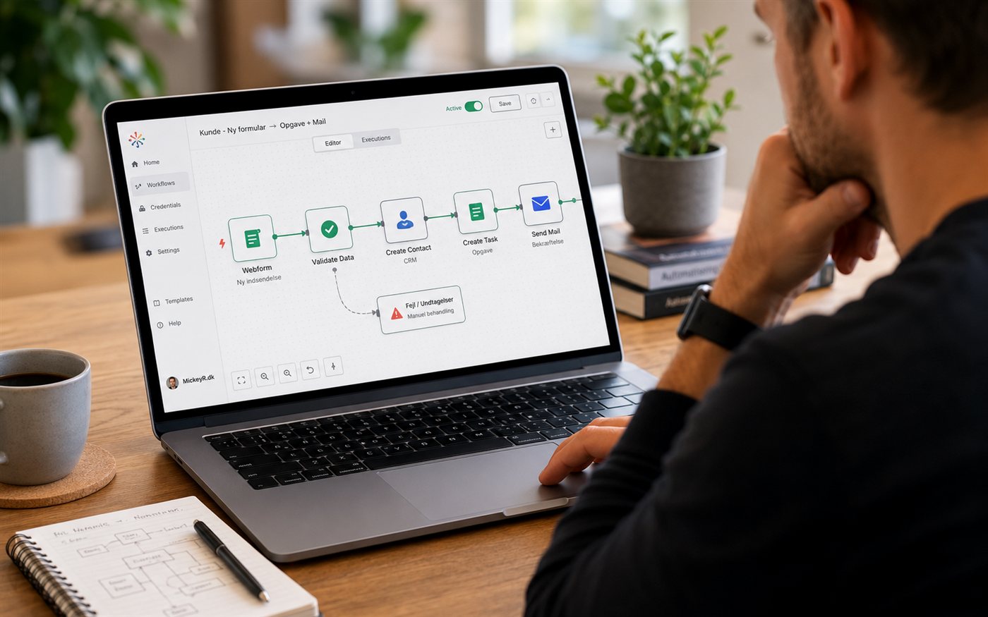 An automated workflow in a visual editor on a laptop: a form is received, data is validated, a contact and task are created, and a confirmation email is sent, with a branch to manual handling on errors
